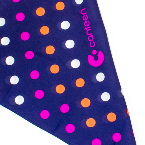 A close up of a polka dot bandanna